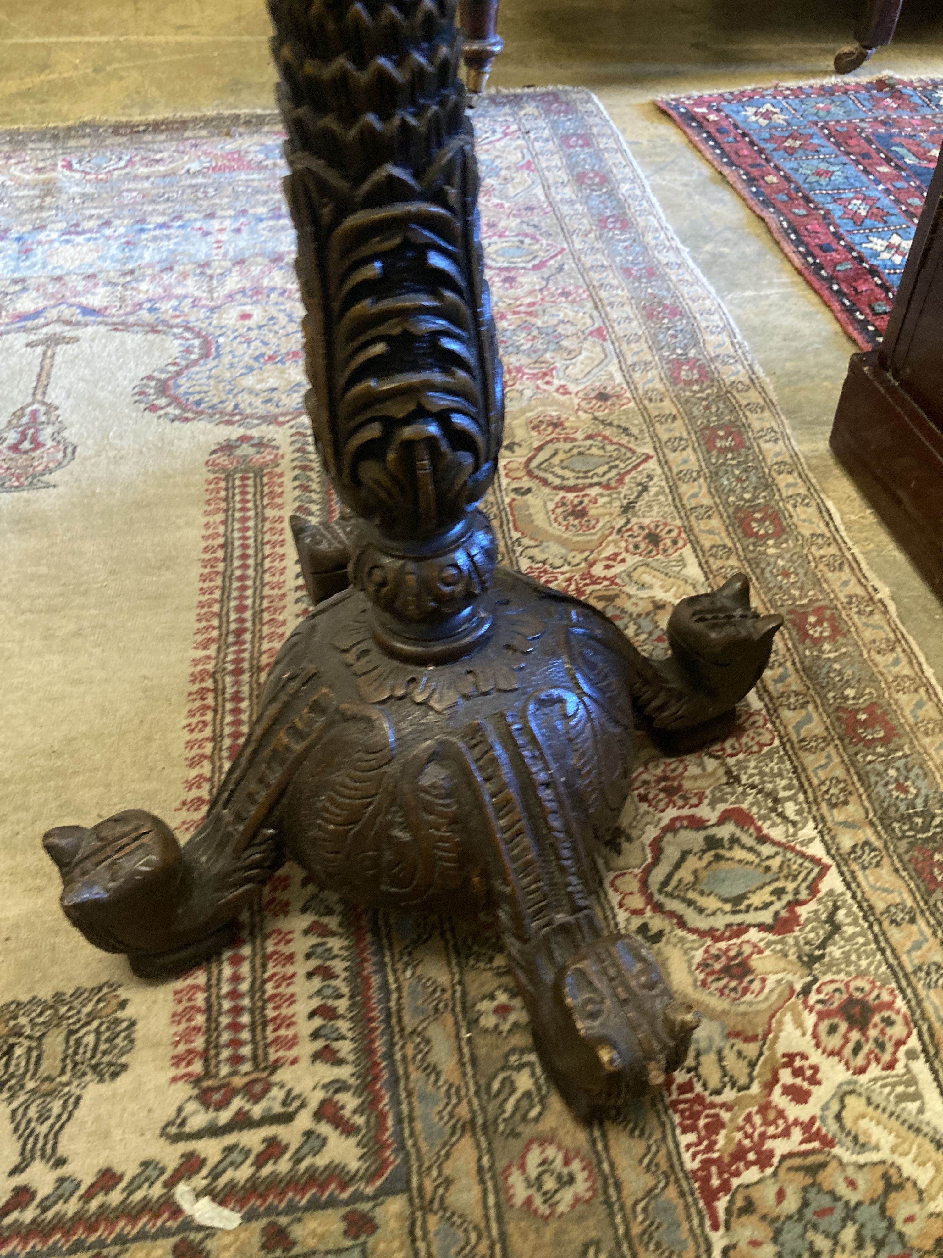A 19th century Burmese carved hardwood jardiniere stand, height 95cm